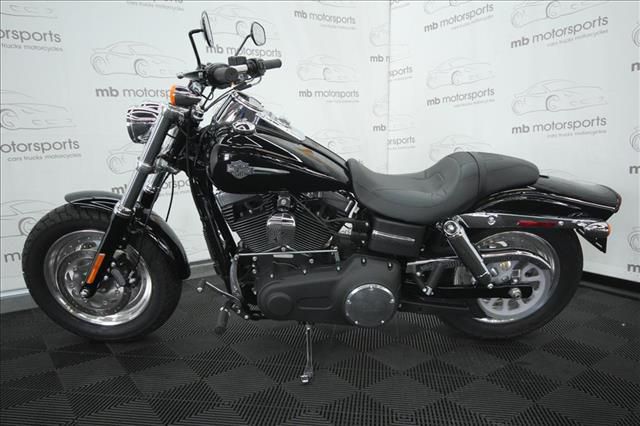 Used 2013 Harley-Davidson Dyna for sale.
