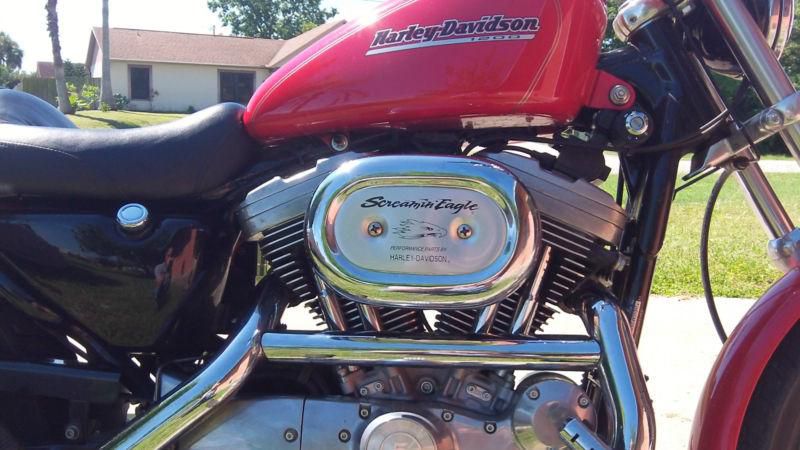 2002 red harley, only 5500 miles, like new.