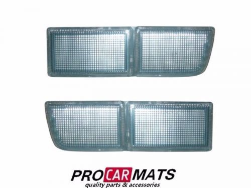 Vw vento 92-98 clear front bumper insert tow towing eye cover left+right pair