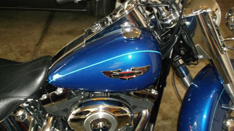 softail deluxe, blue, standard stock bike. shes a beauty