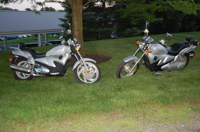 A PAIR OF QLINK LEGACY MOTORCYCLES (AUTOMATIC) TWO FOR ONE DEAL